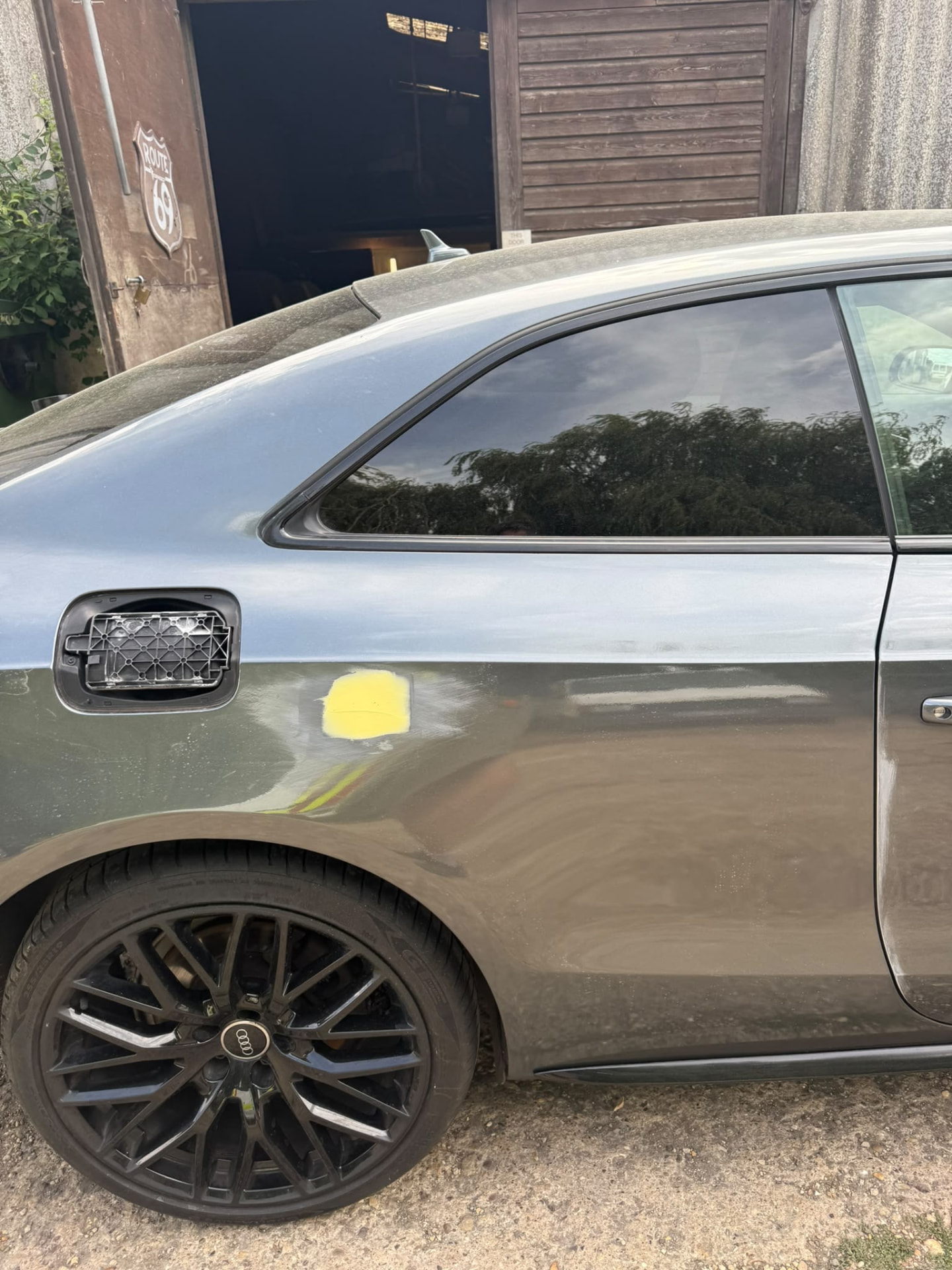 Before 2 — Audi bodywork shown through damage repair, preparation, masking, primer and paintwork.